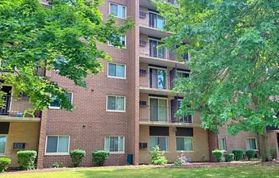 Brick apartment building representing housing affordability